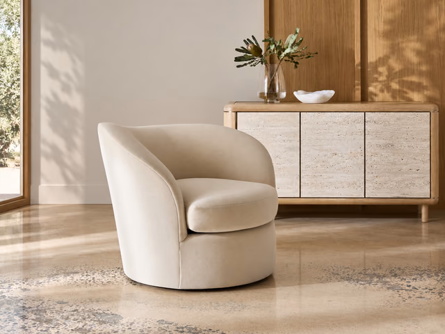 Quasi Swivel Chair by Caracole